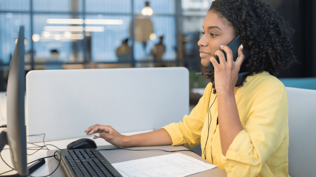 a person is using a phone to make a call