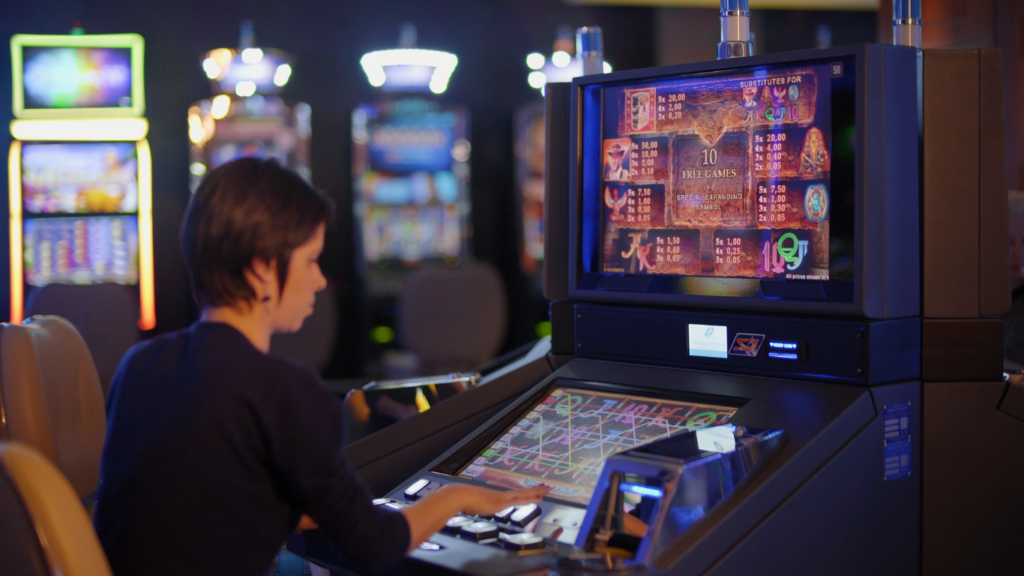 a person on slot machine