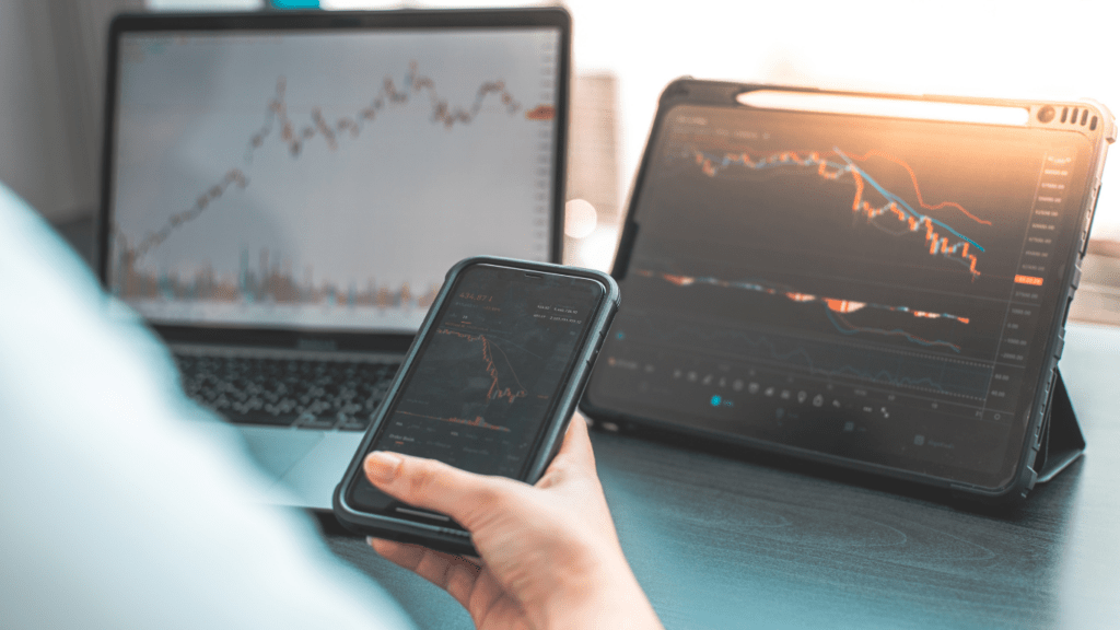 a person using their smartphone to check the stock market